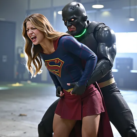 Melissa Benoist as Supergirl, (a very short skirt), fighting with an enemy, she is sexual assaulted from behind by Lex Luther the robot, she bend down, a green lighting collar on her neck, painful face, (Supergirl is screaming in pain), Lex Luther is a str...