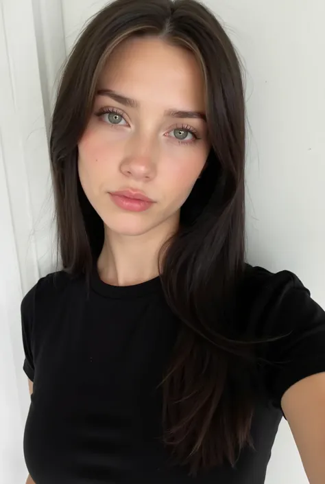 Long black straight hair, beside a white wall, green eyes, wearing a black t-shirt, long hair, taking a cute selfie