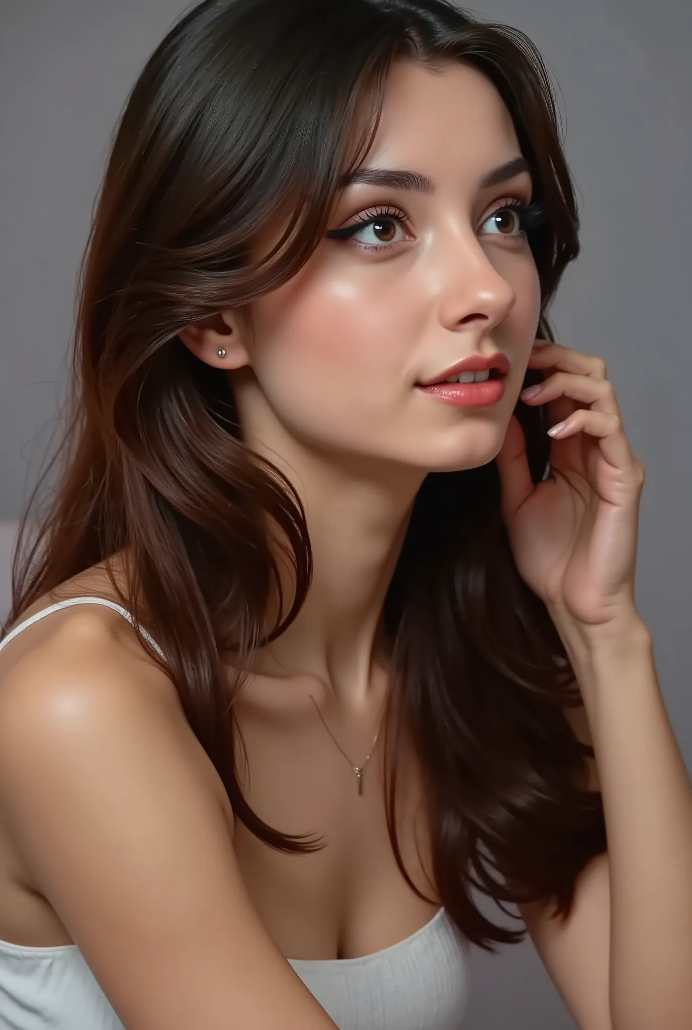 girl 18 years old modeling for the picture, profile shot, looking up, no hands, flat grey background, faceshot,