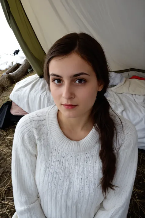 My dead 22 year old Moldovan sister Budeci Mariana Alex looks at me in the tent wearing a full white pulover.