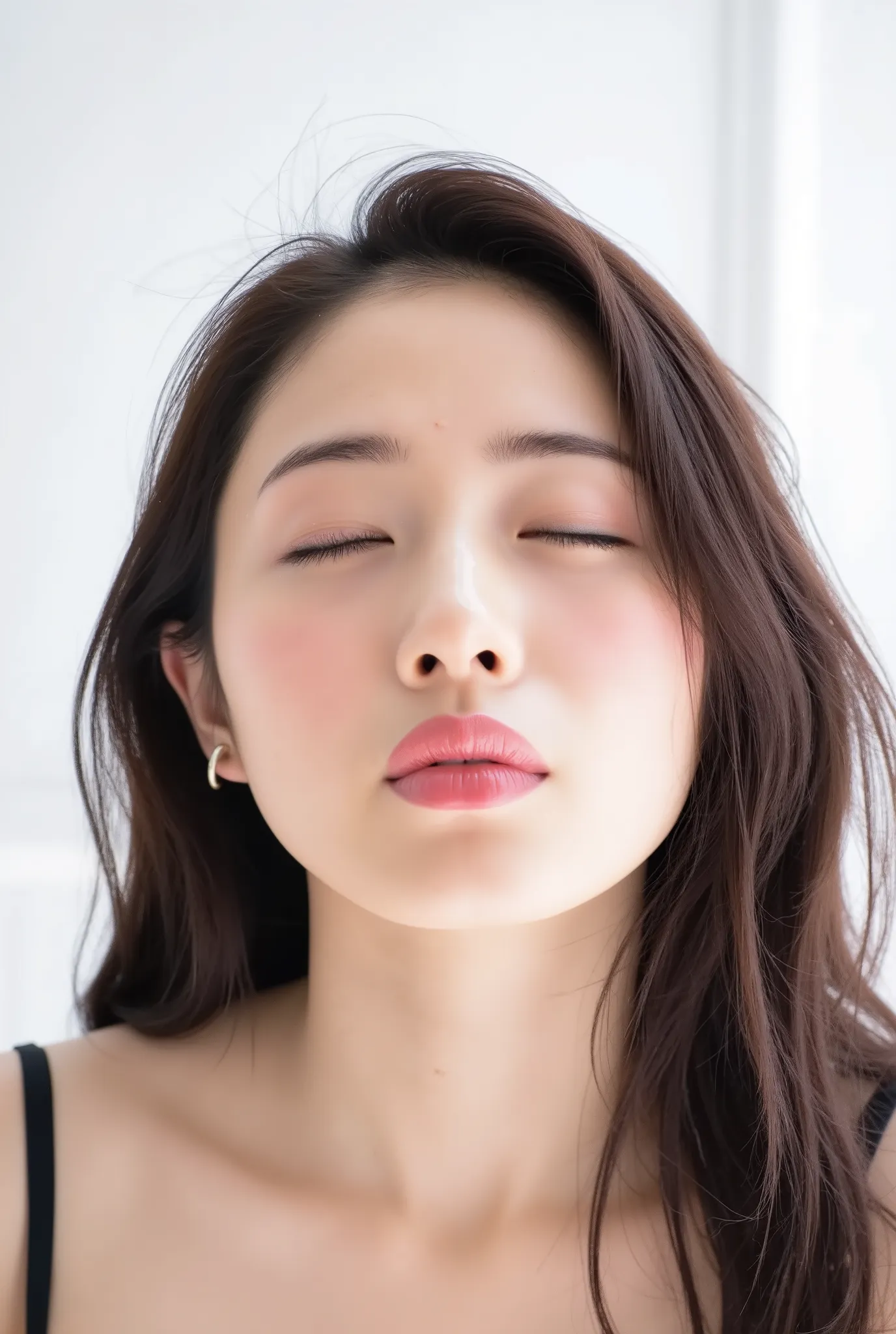 Japanese girl with flushed cheeks and a melting smile, eyes gently closed, lips tightly puckered and pushed forward in a kiss, intensely glossy with wet shine. She wears a black camisole, shown from collarbone up. Captured from a slightly high angle, as if...