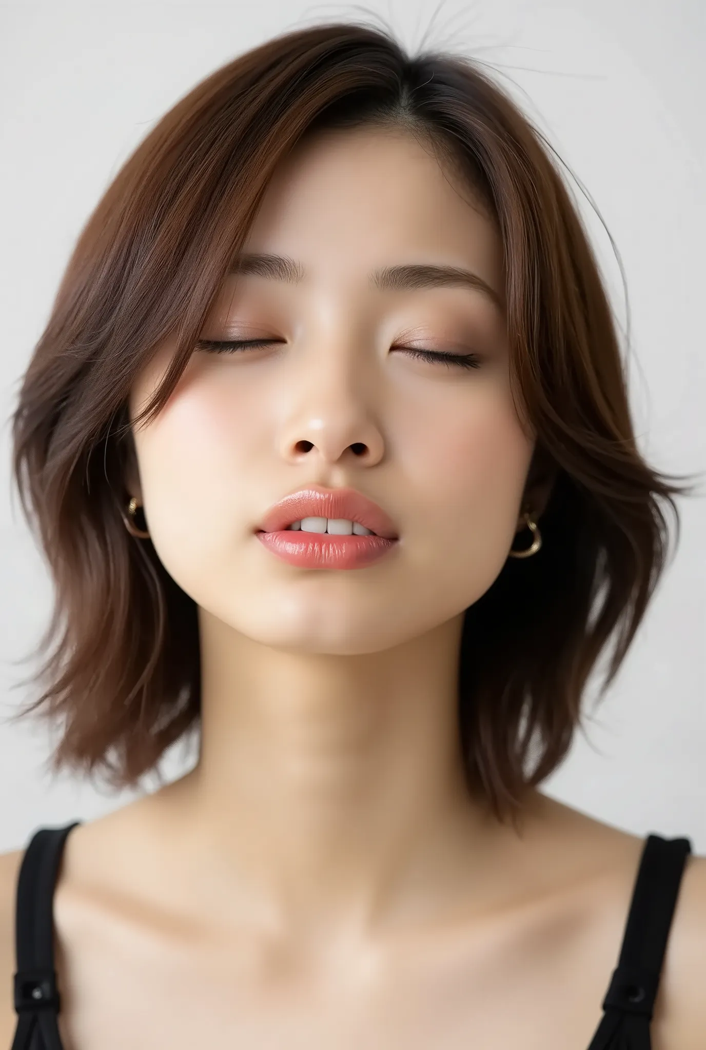 Japanese girl, head and collarbone in frame, black camisole, lips strongly pushed forward in a rounded puckered shape, circular kissy lips with intense gloss, lips as main focal point, soft pink wet lips with high-shine highlights, eyes closed with joyful ...