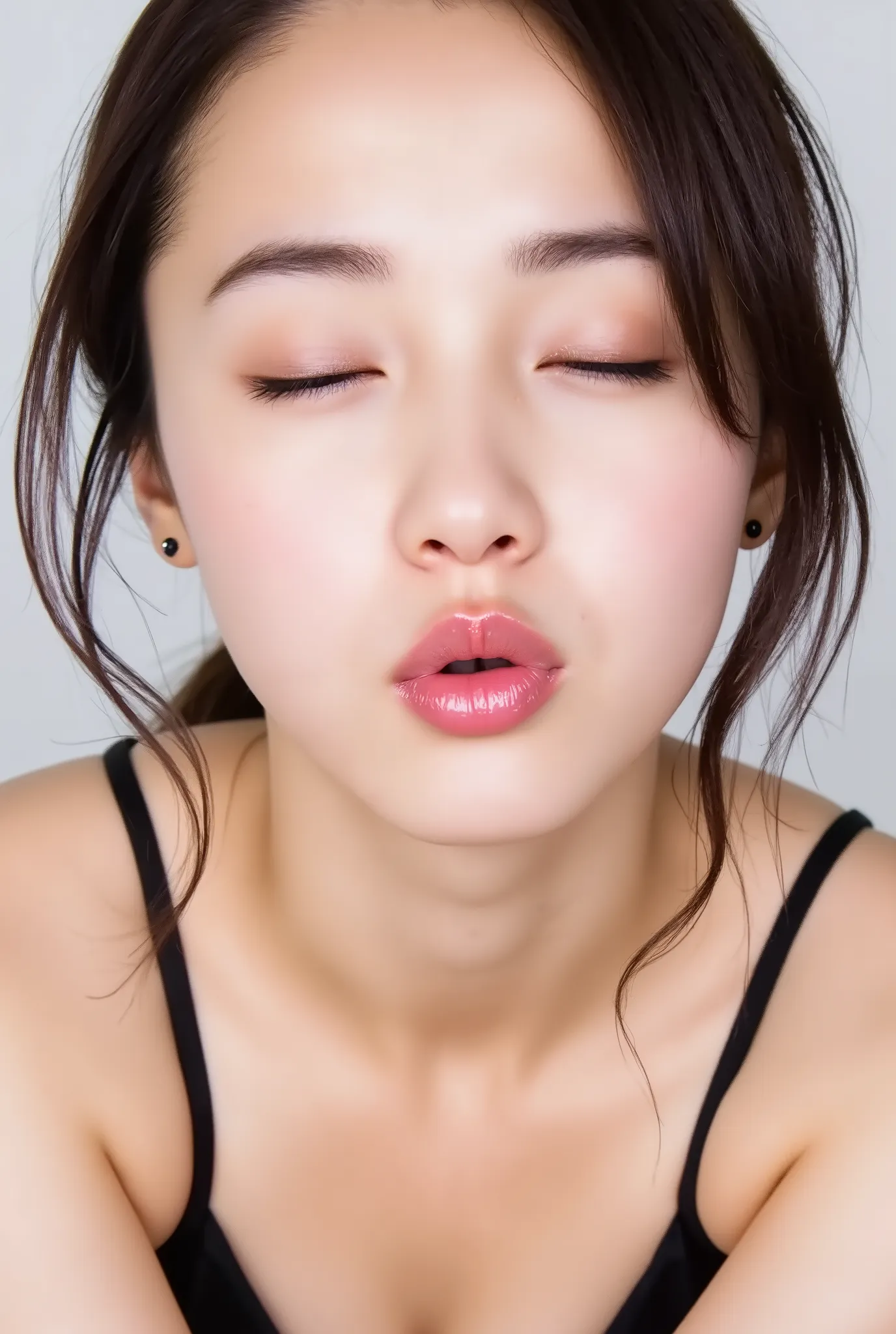 Japanese girl, head and collarbone in frame, black camisole, lips strongly pushed forward in a rounded puckered shape, circular kissy lips with intense gloss, lips as main focal point, soft pink wet lips with high-shine highlights, eyes closed with joyful ...