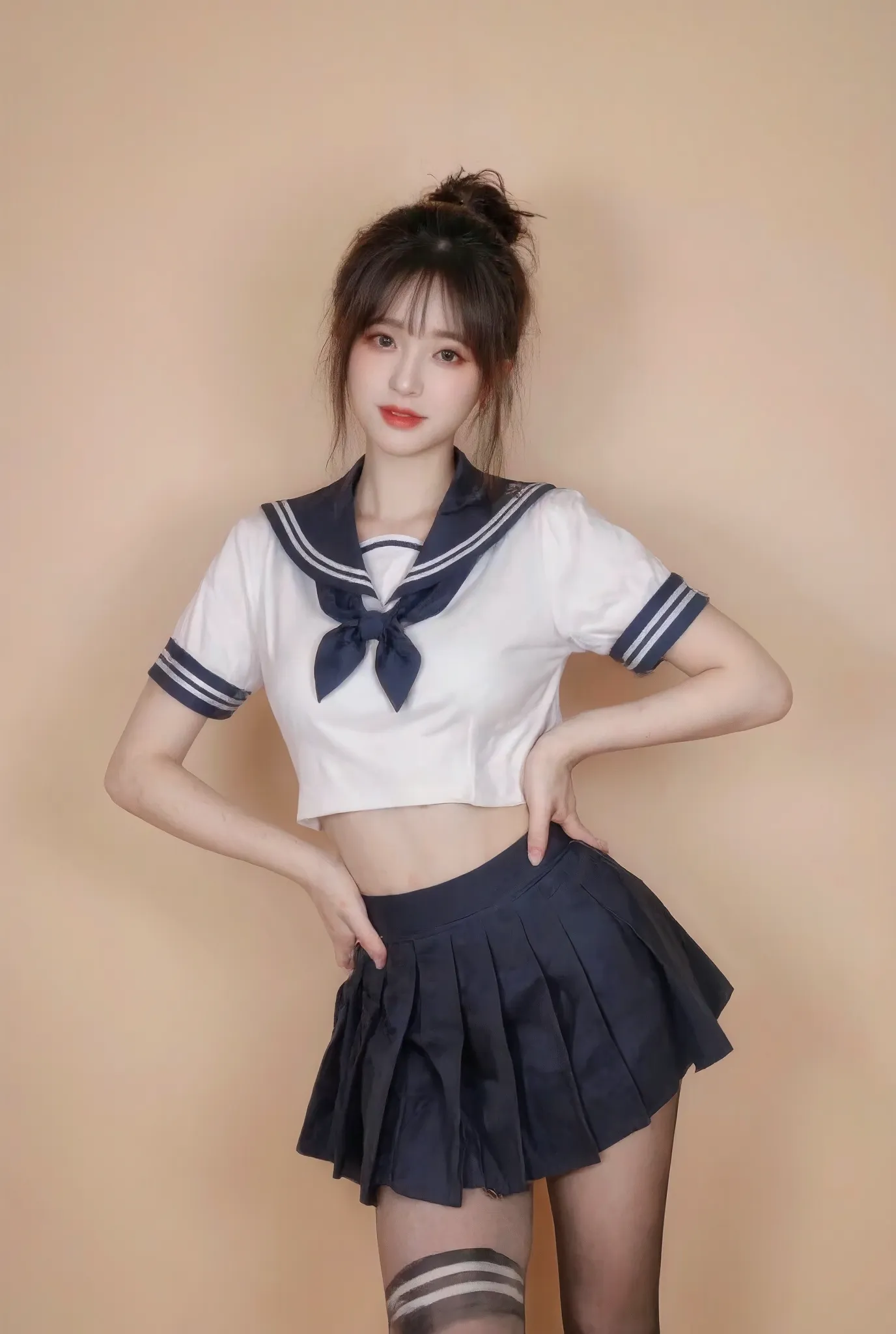(((Masterpiece, ultra detailed, ultra quality, 8K, Photo-realistic))), A stylish young woman poses confidently against a plain beige background, (wearing a modernized Japanese schoolgirl outfit). (((She wears a short white crop top with a navy blue sailor ...