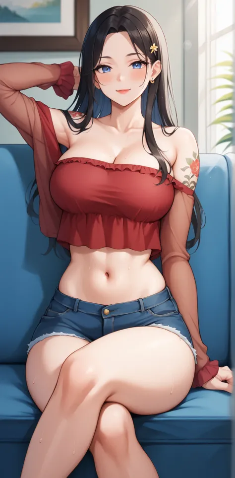 A woman is sitting on a blue couch, her body angled to the side with one arm resting over the back and the other lying softly on her lap. She is wearing a red, off-shoulder sheer crop top with ruffled edges that complement her casual yet stylish look. Her ...