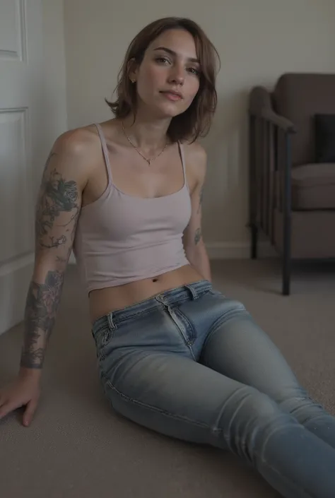 femboy in tight jeans sitting on floor in front of viewer, looking up to viewer with a submissive expression, wearing tank top, in a hotel room