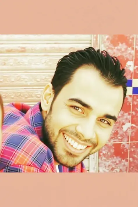 A short cinematic video of a man standing confidently next to the Lebanese singer Nancy Ajram. They are outdoors under soft golden sunset light. Nancy Ajram is smiling and singing to him gently while he looks at her, amazed. The camera slowly moves around ...