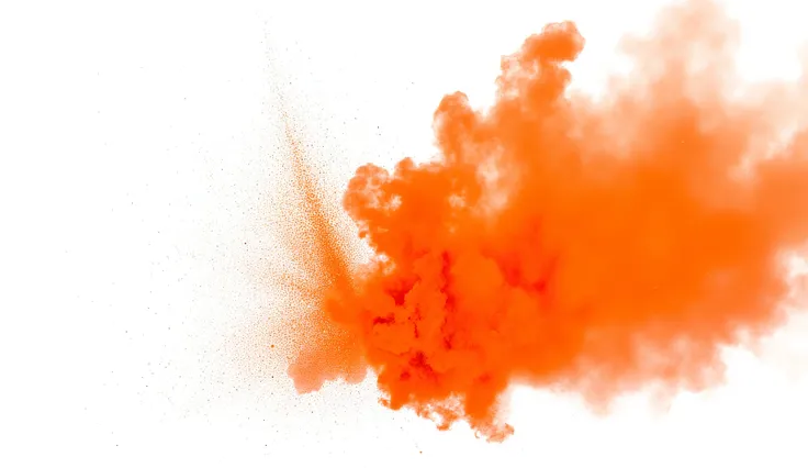 A high-resolution, vibrant photograph captures the moment of an orange powder explosion against a pure white background. The explosion dominates the right and upper portions of the vertical frame, creating a dynamic, cloud-like shape with irregular, jagged...