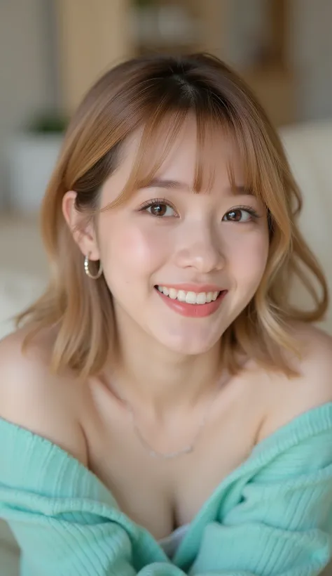 Intimate portrait of a young woman with mid-bob blonde hair and bangs, with a big smile on her face, lying flat on a cream-colored sofa, wearing an aqua off-the-shoulder sweater, shot with a Sony Alpha 7 III, 85mm lens, f/2.0 aperture, ISO 400, 1/200 sec s...