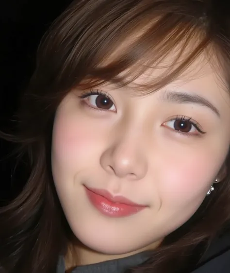 The image is a close-up photograph of a young Asian woman with a fair complexion. Her face dominates the frame, occupying the majority of the image, with her eyes, nose, and lips prominently visible. She has large, almond-shaped eyes with long, thick eyela...
