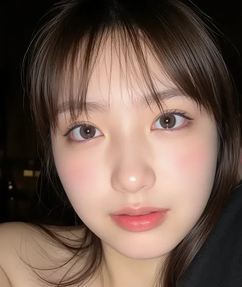 The image is a close-up photograph of a young Asian woman with a fair complexion. Her face dominates the frame, occupying the majority of the image, with her eyes, nose, and lips prominently visible. She has large, almond-shaped eyes with long, thick eyela...