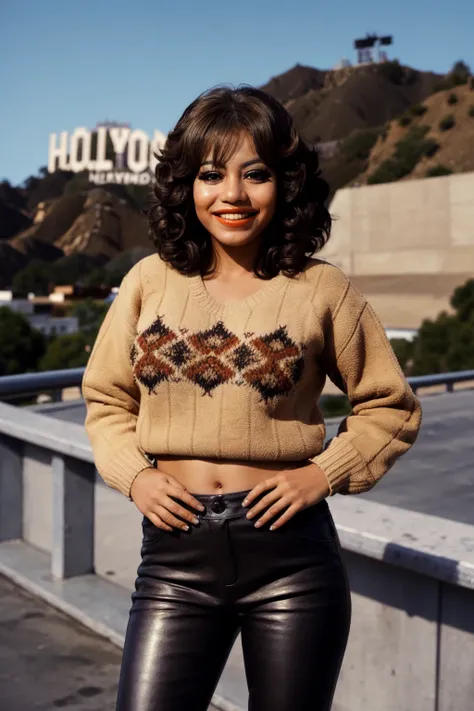 1girl, <lora:KittenN:0.9> kittenn, feathered hair, heavy eyeshadow, big grin, mexican, wearing a sweater and leather pants, standing on top of a building, in front of the hollywood sign,  (insanely detailed, detailed face,detailed eyes, masterpiece, best q...