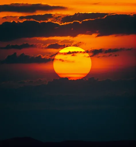 Majestic sunset with the sun engulfed in clouds,vivid orange and black color palette,silhouette of the horizon,atmospheric mood,warm tones,centered composition,prominent sun with visible solar texture,possibly captured with a telephoto lens,minimalist aest...