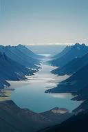 mountains and a body of water surrounded by snow covered mountains