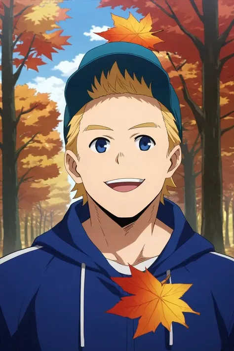 a boy in a blue hoodie and a blue hat smiles while holding a leaf