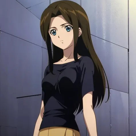 a woman in a black shirt and tan pants standing in front of a wall