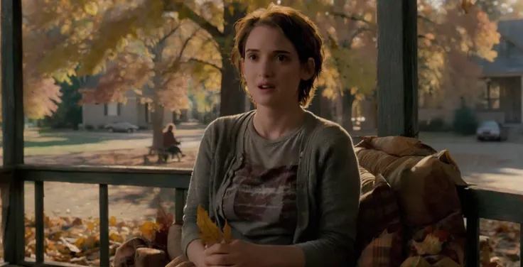 , Movie scene where winona person sits on a rustic porch during autumn, leaves swirling around, set against a backdrop of golden trees, showcasing seasonal serenity. <lora:Winona Ryder (90s) SDXL - Trigger is Winona Person :1>