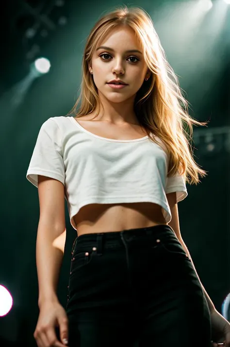 a close up of a woman in a crop top on stage