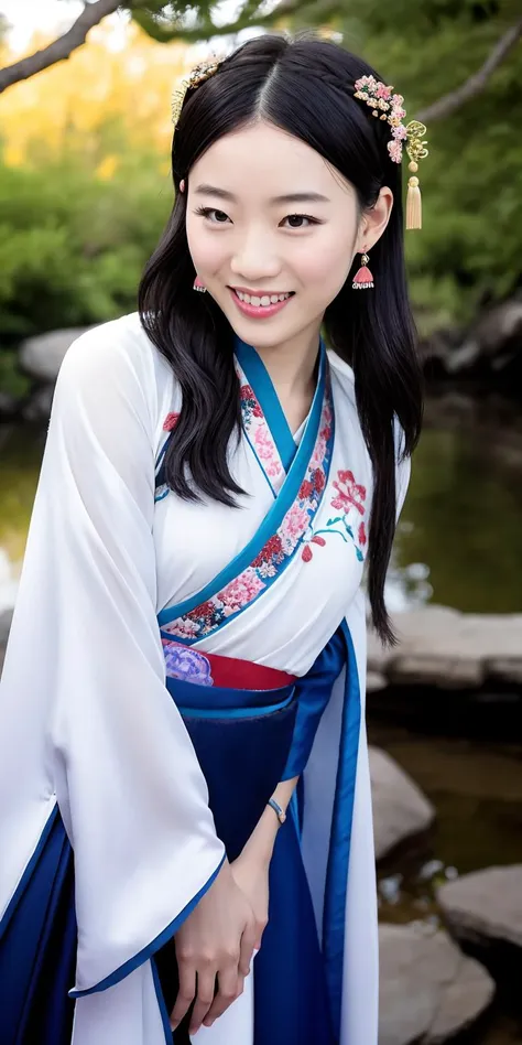 arafed asian woman in a blue and white dress standing by a pond