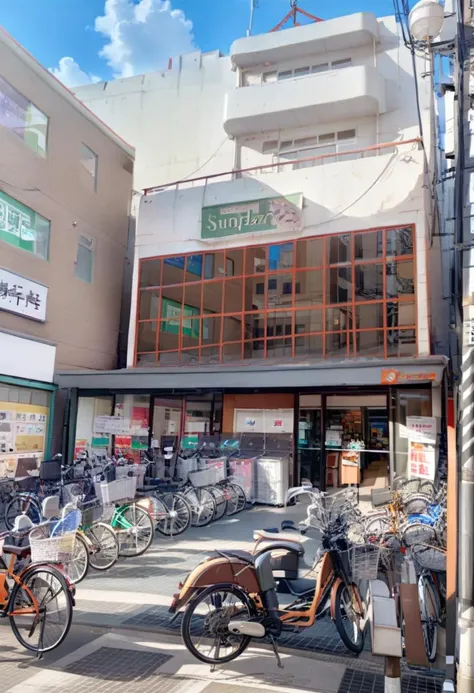 motorcycles parked in front of a building with a lot of windows