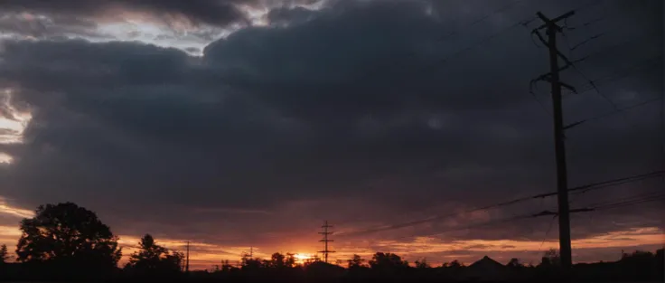 cinematic film still of  <lora:Fright Night 1985 style v2:1>
In the 1980s an epic sunset with a hdr view in the sky,outdoors,sky,cloud,no humans,cloudy sky,scenery,sunset,sun,power lines,utility pole , horror themed, dark themed, low key light, dramatic li...