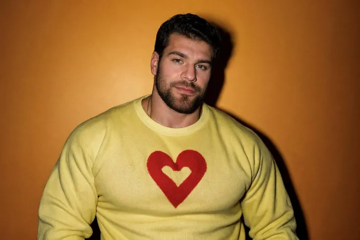 stubble, 80s heartthrob, 1boy, bara, muscular, hunky male, homoerotic, wearing a Retro-style sweatshirt, handsome man, sunkissed, professional lighting, artistic shot, cinematic, yellow background