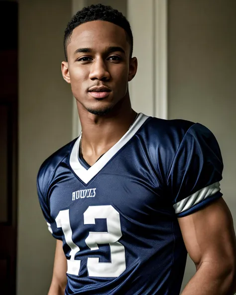 arafed man in a football uniform posing for a picture