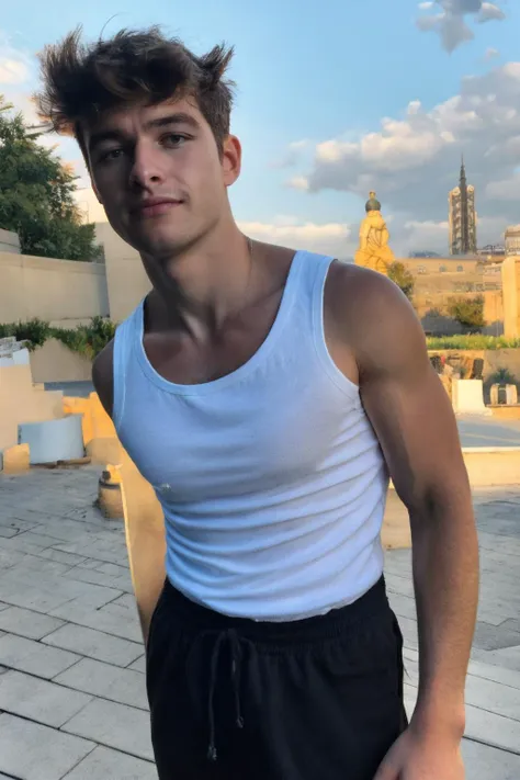 arafed man in white tank top standing on a sidewalk