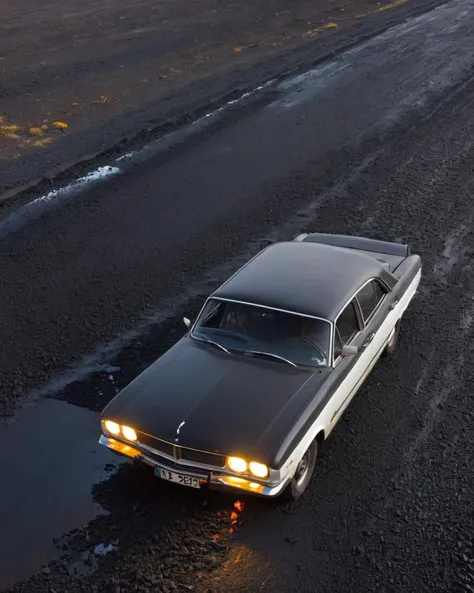 a car in the Bitumen<lora:Car_Dream:1>