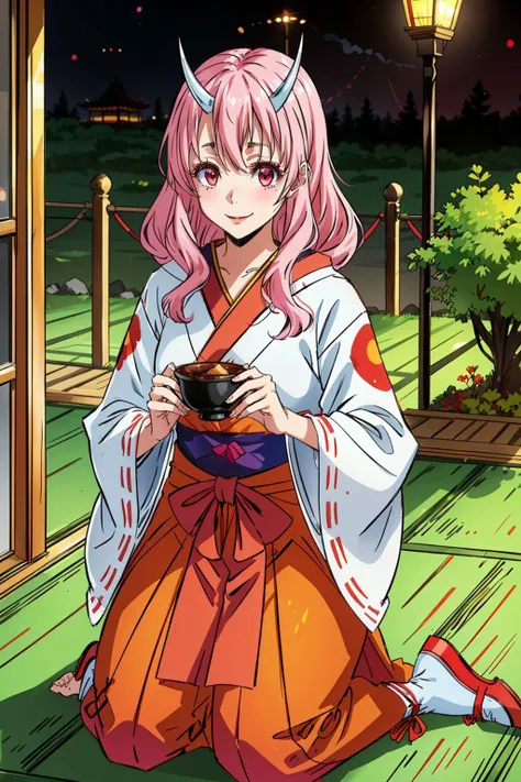 a woman in a kimono outfit sitting on the ground