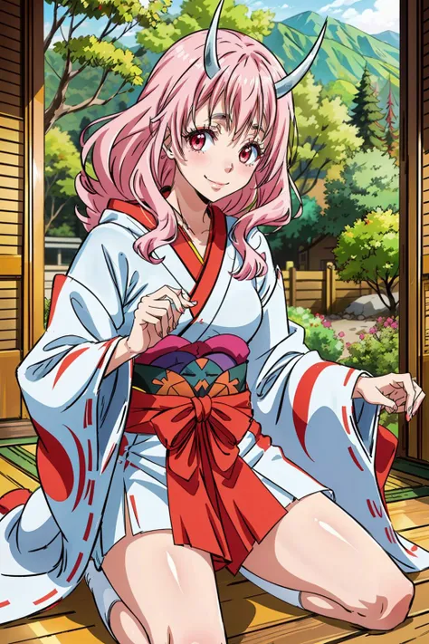 a woman in a kimono outfit sitting on the floor