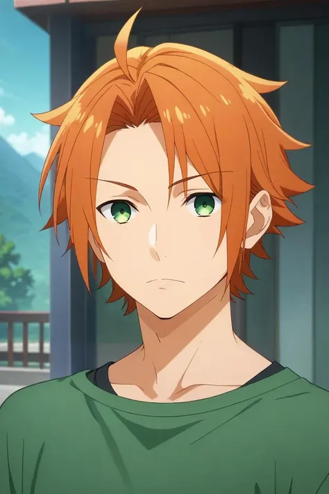 a young man with orange hair and green eyes looks at the camera