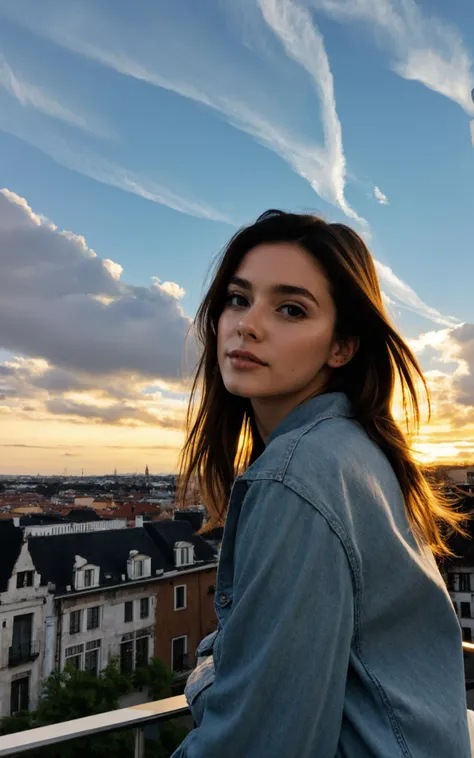 a woman standing on a balcony looking at the camera