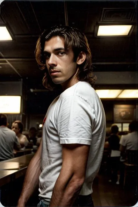 arafed man with long hair standing in a cafeteria