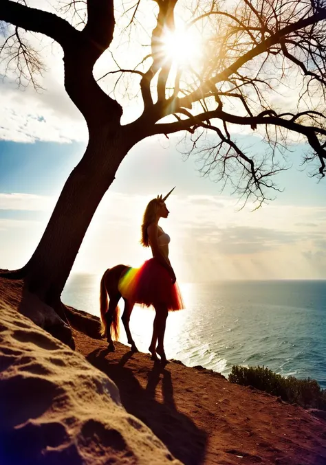 there is a woman riding a horse on a hill near the ocean