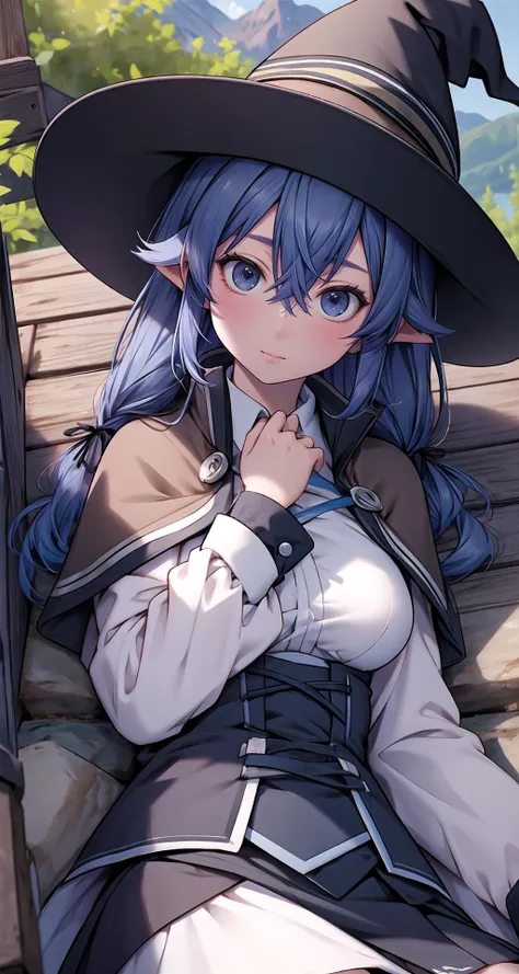 a woman in a witch hat sitting on a bench