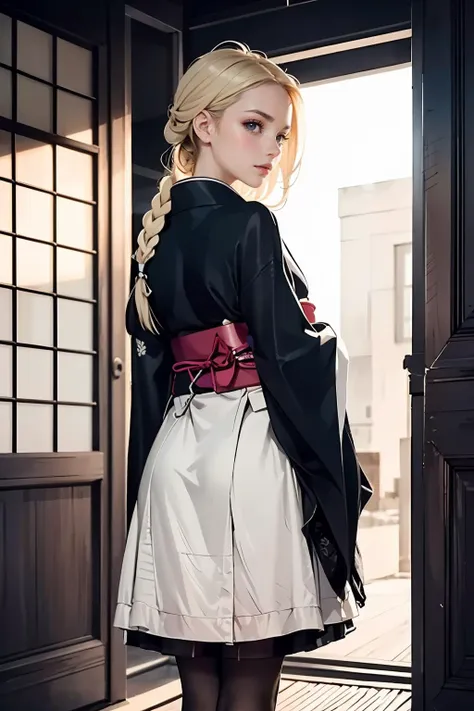 blond woman in a black kimono and white dress standing in front of a door