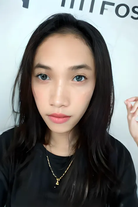 a close up of a woman with long hair wearing a black shirt