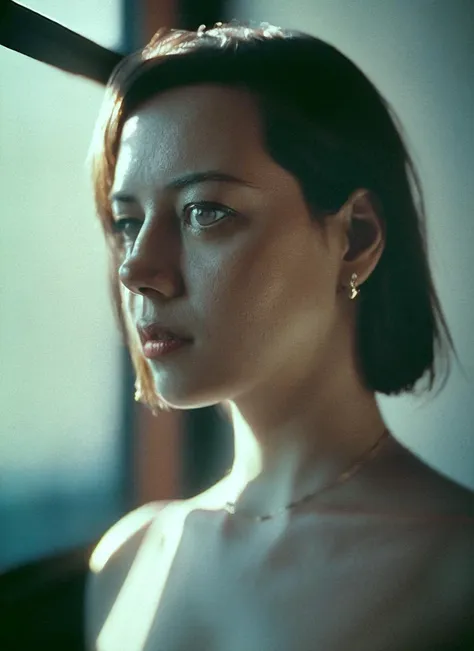 a close up of a woman with a necklace on looking out a window