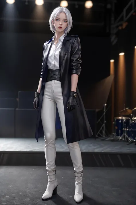 a woman in a black coat and white pants standing on a stage