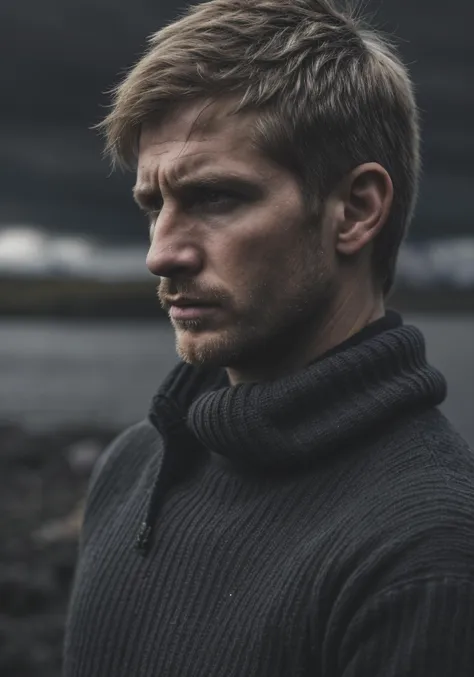 a man in a black sweater standing next to a body of water