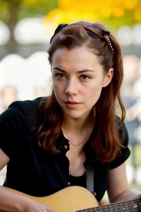 lisaHannigan1 holding a guitar, sitting down, closeup portrait, in a outdoor cafe in 2015, afternoon light