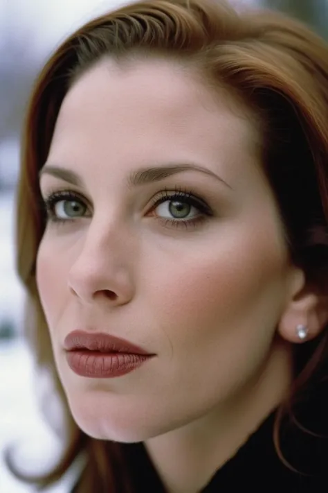 a close up of a woman with a black shirt and earrings