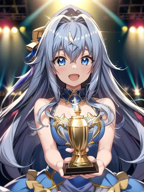 a woman in a blue dress holding a trophy in front of a stage