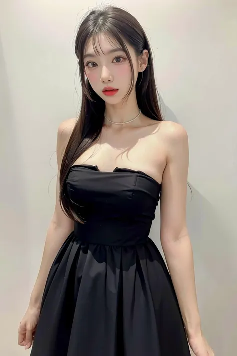 a woman in a black dress posing for a picture