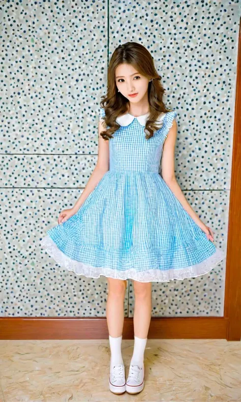 a close up of a young girl in a blue dress and white shoes