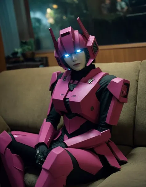 a close up of a person in a pink costume sitting on a couch