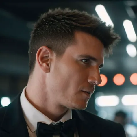 a close up of a man in a tuxedo looking at something