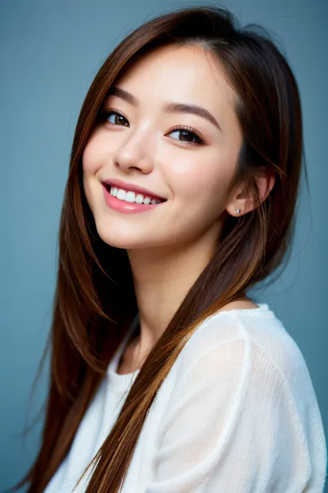 a woman with long brown hair smiling and wearing a white shirt