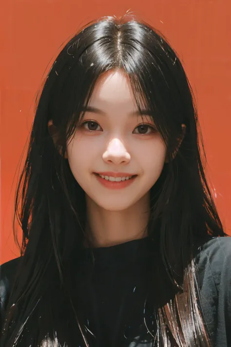 a woman with long black hair and a black shirt